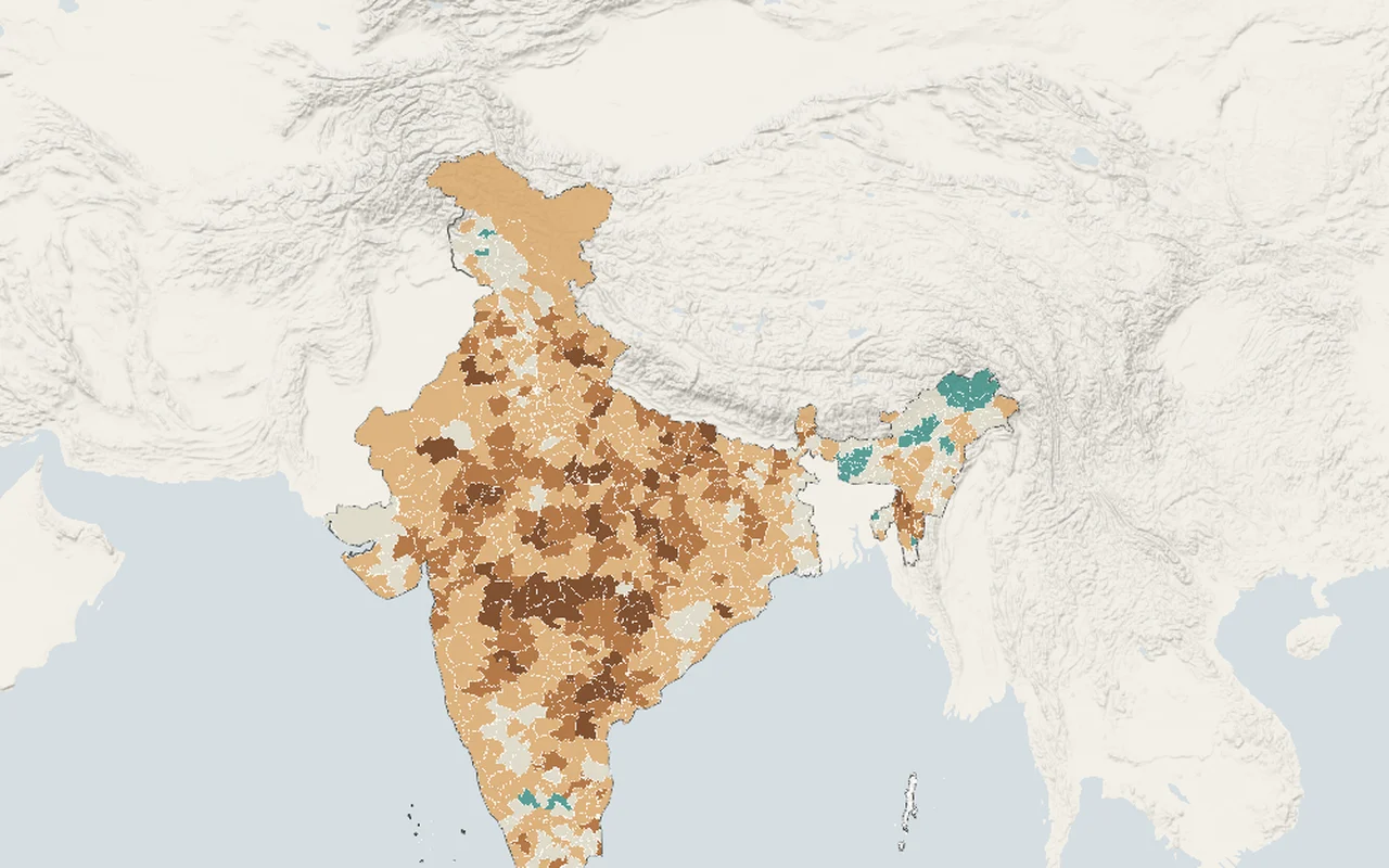 ENSO: India's districts shaded by how often their monsoon rain fell short in strong El Niño years, brown across the centre and north, teal in the north-east