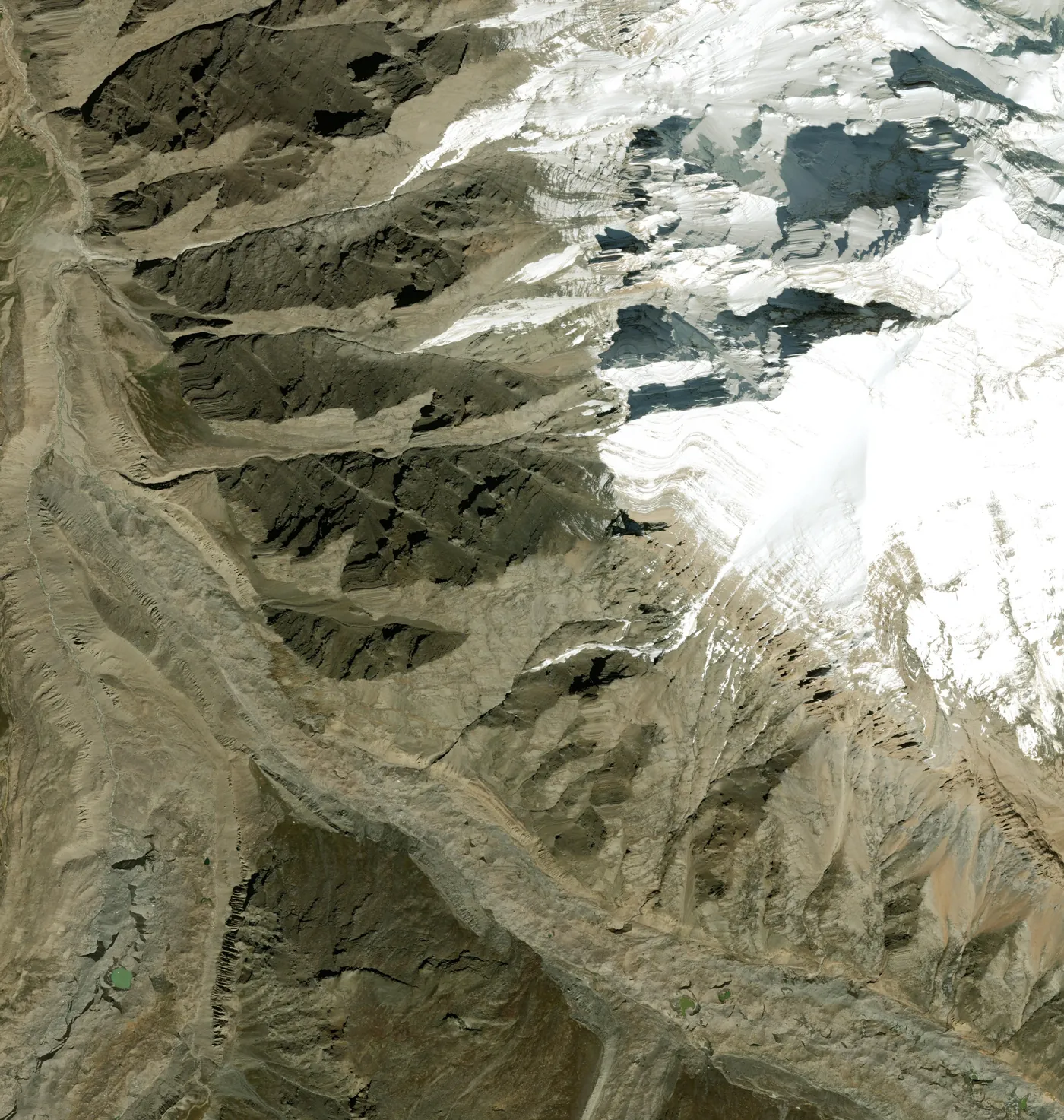 Everything on one map: the camp on its ridge, the fall to the glacier, the ring where a fall to the west would end, and the stretch of glacier where the generator most likely lies